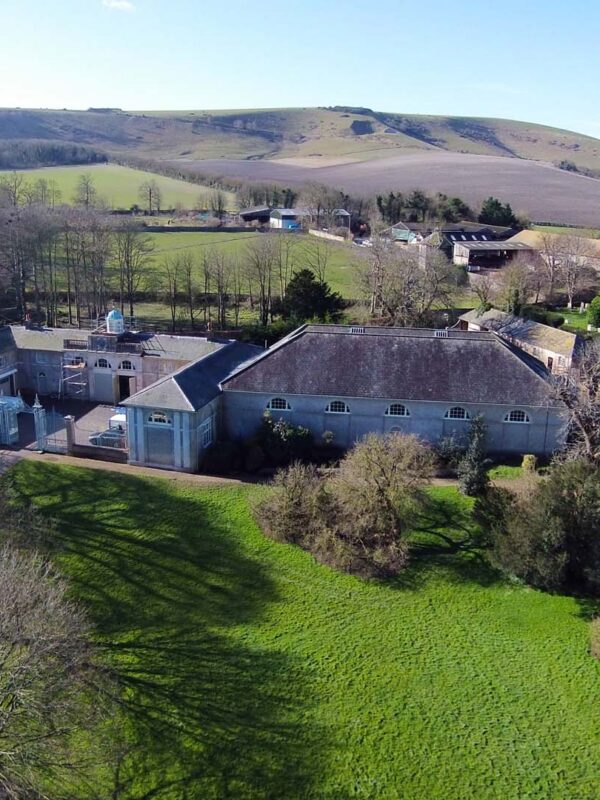 Aerial view of Firle Place and adjoining riding school