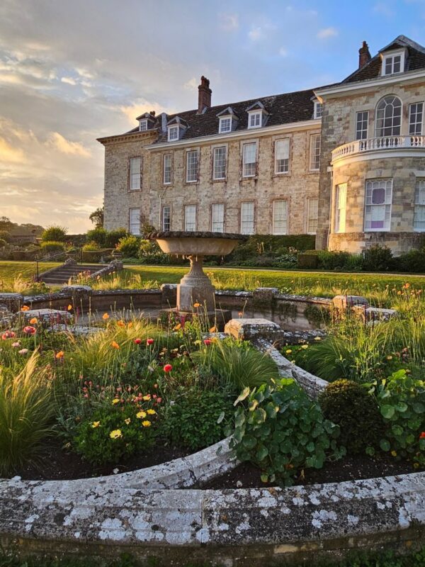 Garden and fountain in front of Firle Place