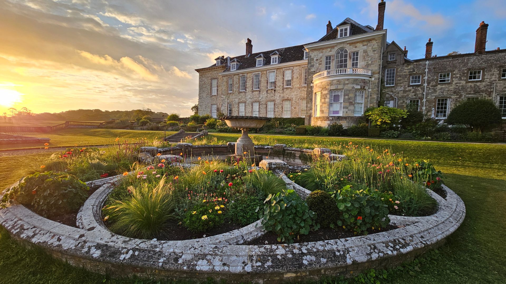 Garden and fountain in front of Firle Place