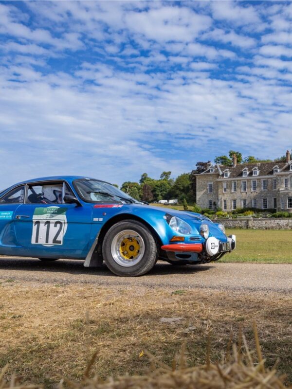 Sports car in front of Firle Place at automotive event